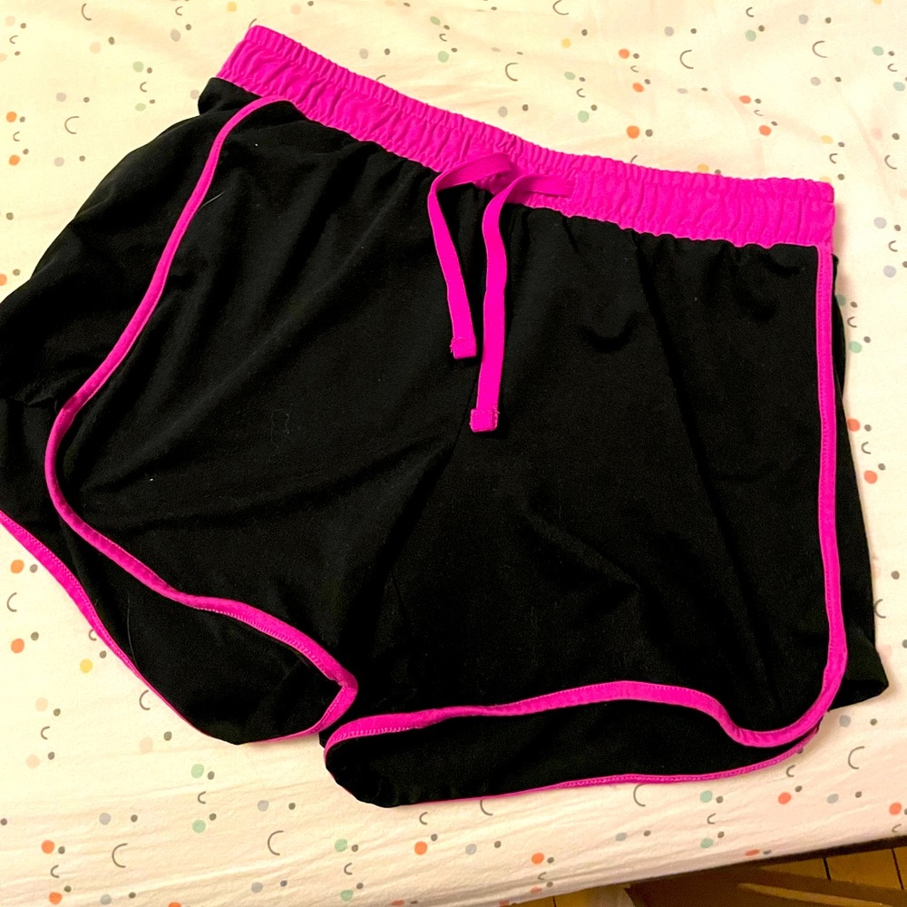 Pink and black athletic shorts